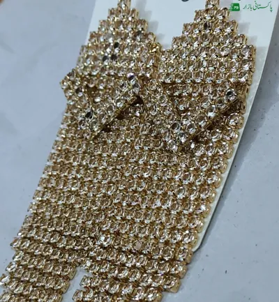 Earing golden cloure long size with beutiful desai